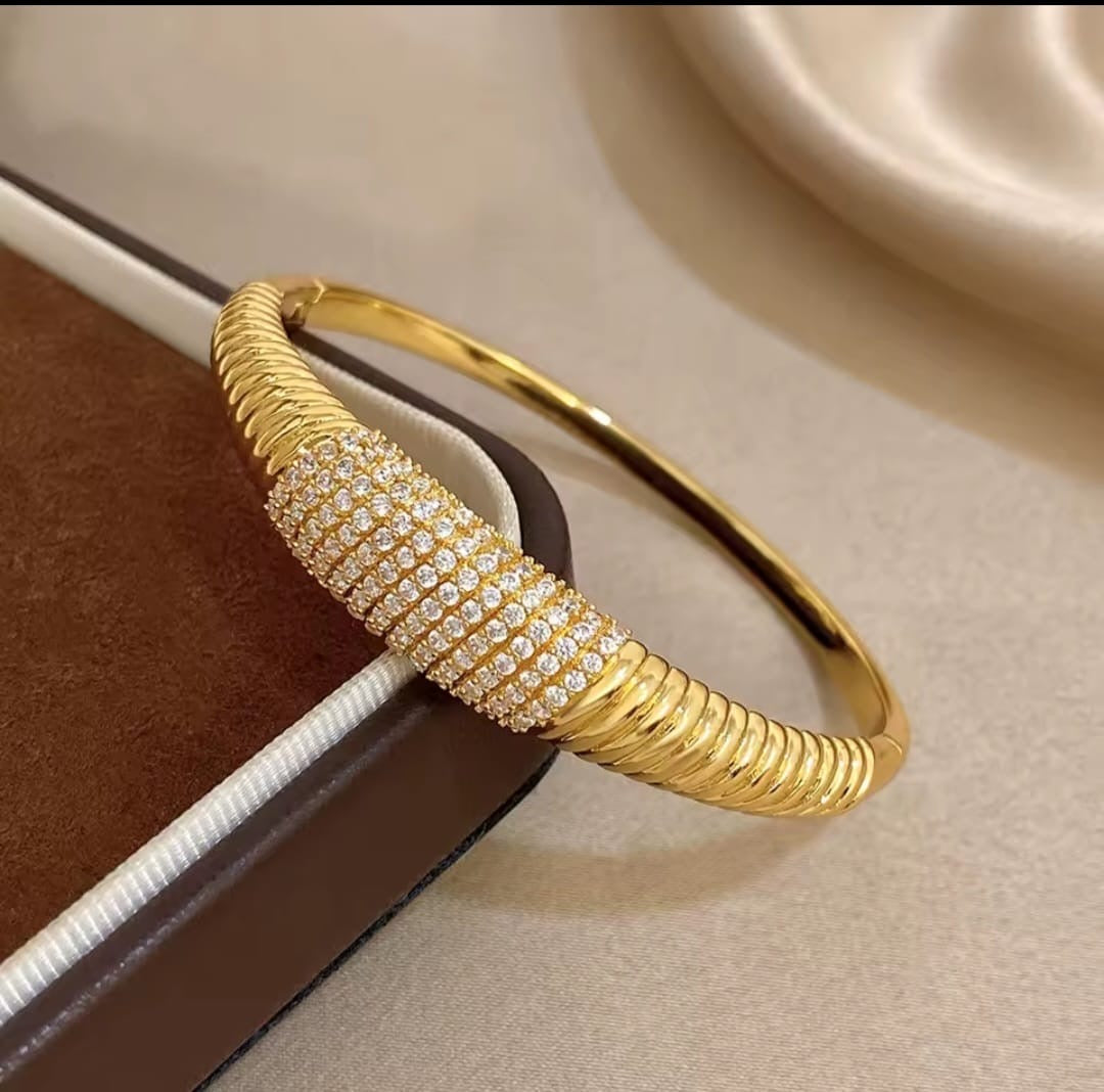 Pavéra™ Gold Plated Serpentine Cubic Zirconia Bangle