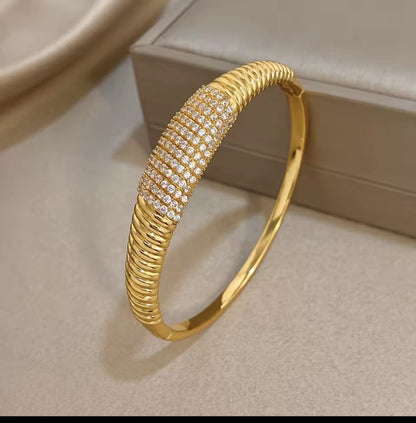 Pavéra™ Gold Plated Serpentine Cubic Zirconia Bangle