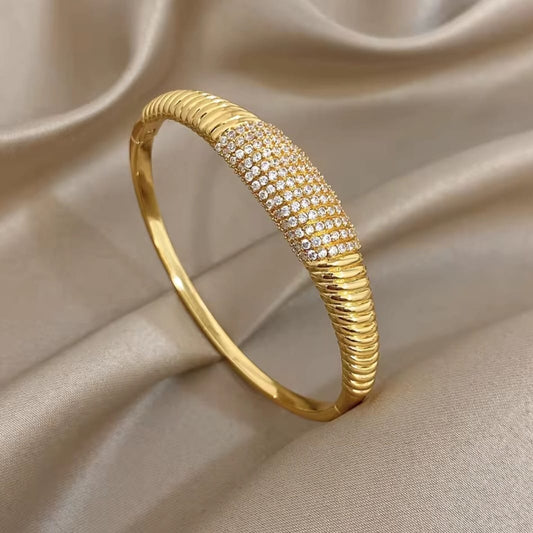 Pavéra™ Gold Plated Serpentine Cubic Zirconia Bangle